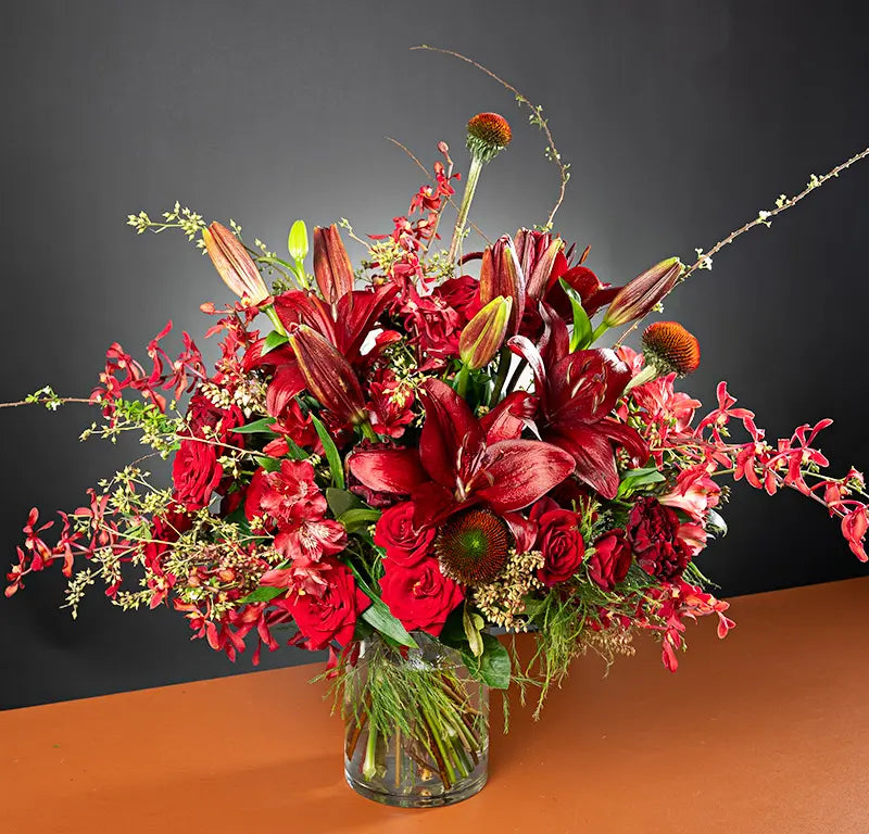 Unleash Romance with Our Secret Bouquet Crimson Flower Bouquet
